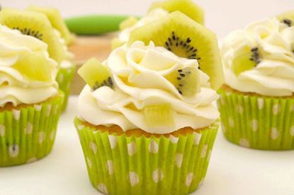 several kiwi flavored cupcakes on a table