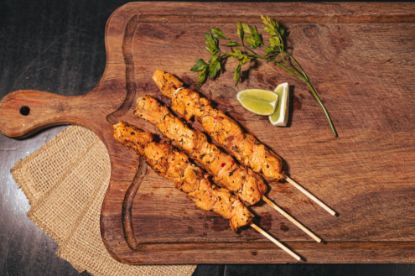Chicken Skewers on Cutting Board