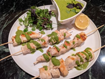 chicken skewers on a plate